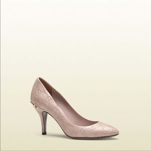 Gucci women’s pink Guccissima mid heel pump